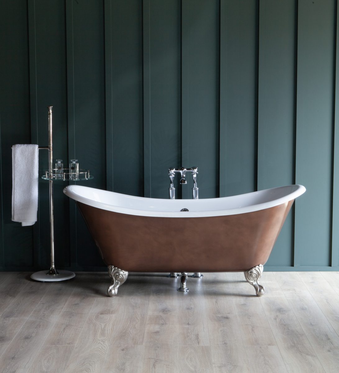 Imperium Double Ended Bath with burnished Bronze exterior and nickel plated feet. Hand made to order at our factory in Essex and available in three lengths - 1645mm, 1765mm and 1810mm. Choose from a vast range of colours mixed in a high technology polyurethane paint. This gives a washable and durable coating for the busy bathroom. Also available are our in-house hand applied metallic burnished effect finishes of Gold, Bronze or Iron effect.