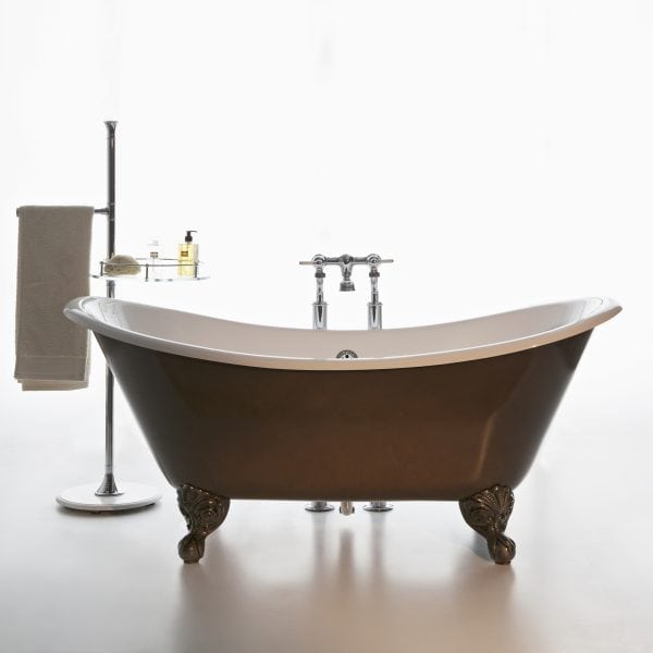Elegant vintage-style freestanding bathtub with clawfoot design, paired with a sleek towel stand and luxury bath accessories, perfect for a sophisticated bathroom setting.