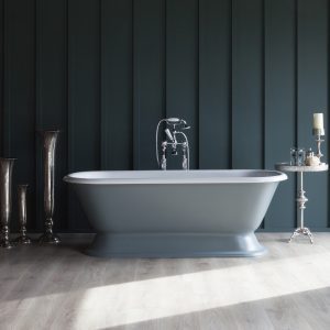 Elegant freestanding bathtub with chrome fixtures against a stylish dark wall, showcasing luxury bathroom design by Albion Bath Co Ltd, perfect for a contemporary spa or personal wellness space.