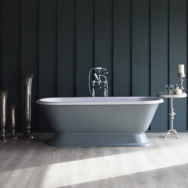 Elegant freestanding bathtub with chrome fixtures against a stylish dark wall, showcasing luxury bathroom design by Albion Bath Co Ltd, perfect for a contemporary spa or personal wellness space.