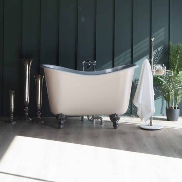 Luxury vintage clawfoot bathtub with chrome fixtures in a modern elegant bathroom setting.