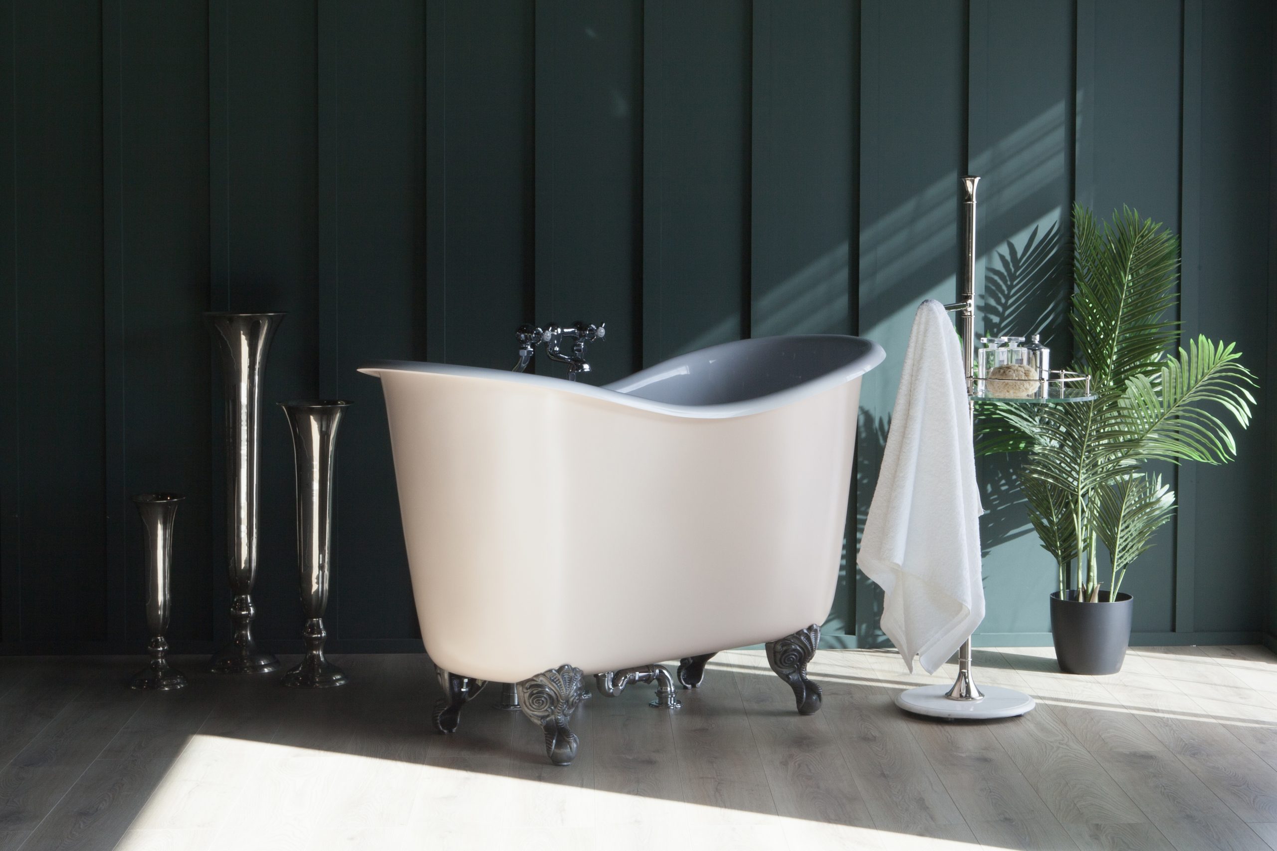 Tubby Too double ended bath slightly angled front on view. Bath shown with painted exterior and burnished Iron feet.