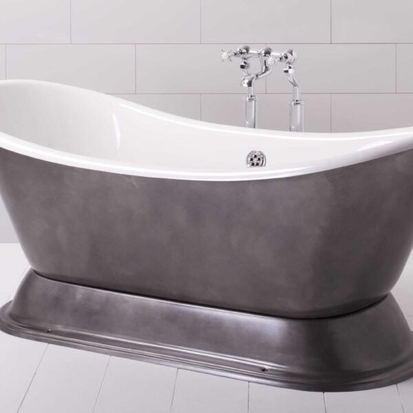 Cast iron roll-top bathtub with chrome antique-style taps, classic clawfoot design, ideal for luxury bathrooms, by The Albion Bath Co Ltd.
