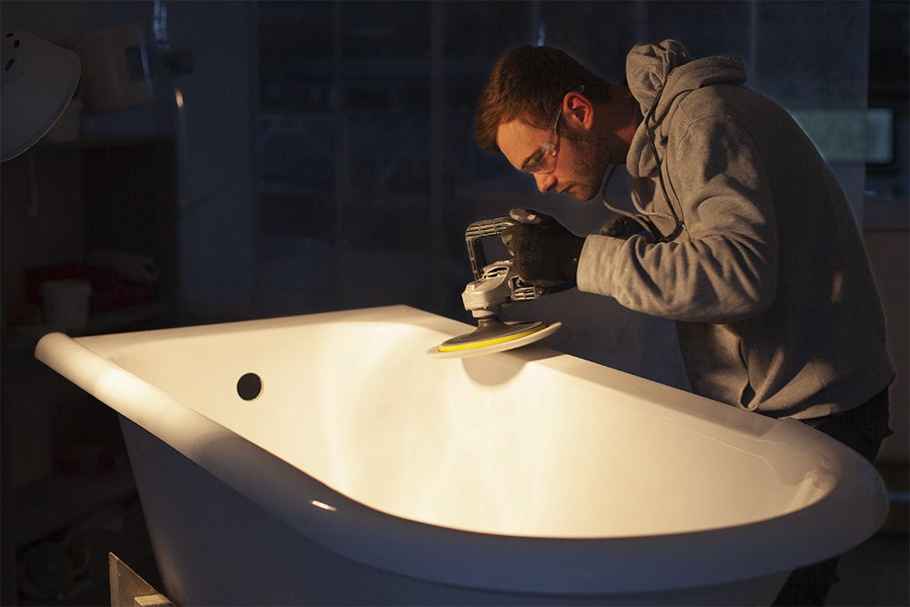 An Albion Bath being polished at our Weeley factory.