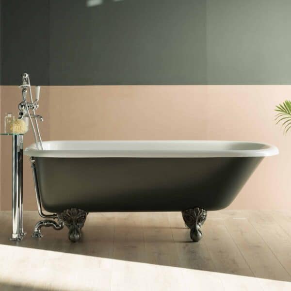 Elegant freestanding clawfoot bathtub with vintage brass legs, ideal for luxury bathroom remodels and high-end soaking baths.