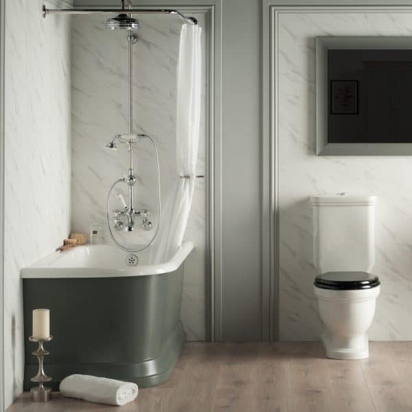 A luxurious vintage-style bathroom featuring a classic white bathtub with grey exterior, chrome fixtures, a separate shower with a white curtain, and a modern white toilet with a black seat, all set against marble-effect walls.