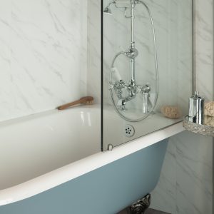 Elegant vintage-style bathtub with chrome fixtures and hand-held shower, set against a marble wall, showcasing Albion Bath Co's luxury bathroom fittings.
