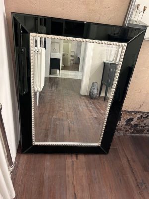 black edge mirror with silver inset frame