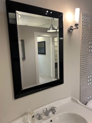 black glass frame mirror